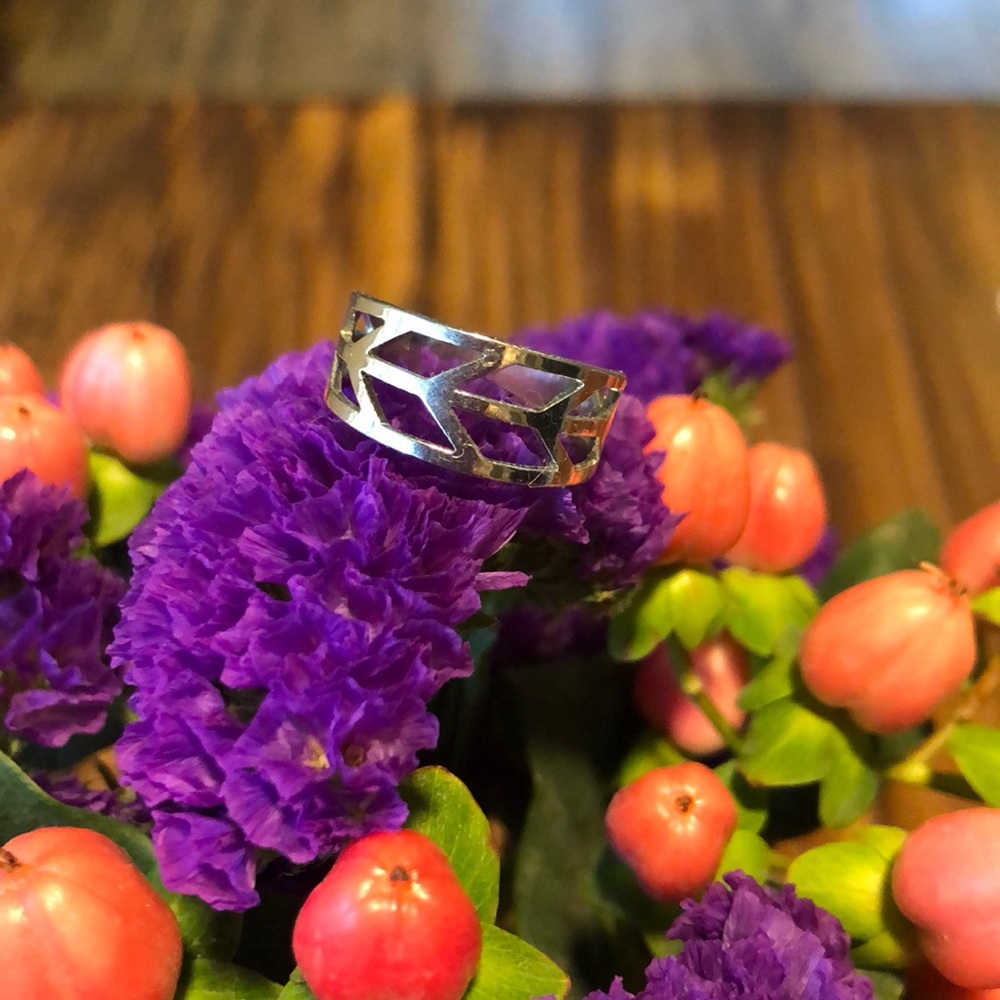 Silver ring with stripped pattern